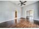 Living room with hardwood floors and access to other rooms at 750 E Pearl St, Bartow, FL 33830