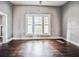 Spacious living room featuring hardwood floors and large windows at 750 E Pearl St, Bartow, FL 33830