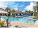 Resort-style pool with water features and lounge area at 7859 Summerlake Groves St, Winter Garden, FL 34787