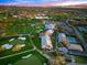 Aerial view of golf course, clubhouse, pool, and surrounding area at 8513 Bay Hill Blvd, Orlando, FL 32819