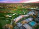 Aerial view of golf course, clubhouse, and surrounding neighborhood at 8513 Bay Hill Blvd, Orlando, FL 32819