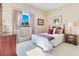 Cozy bedroom featuring a double bed and a large window at 8513 Bay Hill Blvd, Orlando, FL 32819