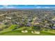 Neighborhood view with houses, golf course, and lake at 8513 Bay Hill Blvd, Orlando, FL 32819