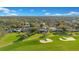 Aerial view showcasing neighborhood by golf course at 8513 Bay Hill Blvd, Orlando, FL 32819