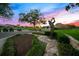 Golf statue and course scenery at sunset at 8513 Bay Hill Blvd, Orlando, FL 32819