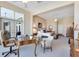 Open bedroom boasts a desk with a view, sitting area, and stairs to the side of the bed at 8513 Bay Hill Blvd, Orlando, FL 32819