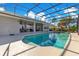 Enclosed pool with sun deck overlooking the golf course at 8513 Bay Hill Blvd, Orlando, FL 32819
