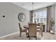 Bright breakfast nook features a round table and four chairs at 943 Gracie Ridge St, Clermont, FL 34715