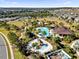 Aerial view of community pool, playground and other recreational areas at 943 Gracie Ridge St, Clermont, FL 34715