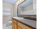 Clean bathroom with vanity, large mirror and shower/tub combo at 958 Dunraven Dr, Winter Park, FL 32792