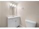 Updated bathroom with vanity and toilet at 958 Dunraven Dr, Winter Park, FL 32792