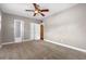 Cozy carpeted bedroom with ceiling fan and ample closet space at 958 Dunraven Dr, Winter Park, FL 32792