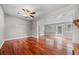 Bright living room with hardwood floors and access to backyard at 958 Dunraven Dr, Winter Park, FL 32792