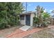 Small storage shed with brick pathway and landscaping at 958 Dunraven Dr, Winter Park, FL 32792