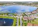 Community overview with lake and clubhouse at 11346 Lemon Lake Blvd, Orlando, FL 32836