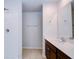 Bathroom featuring a walk-in shower, vanity with sink, and tile flooring at 1147 Moyle Way, Mascotte, FL 34753