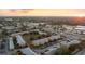 Aerial view of community featuring building exteriors, parking, and landscaping at 120 Georgetown Dr, Casselberry, FL 32707