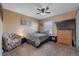 Cozy bedroom with double bed, dresser, and window at 120 Georgetown Dr, Casselberry, FL 32707