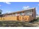 Brick building with wooden fence and patio area at 120 Georgetown Dr, Casselberry, FL 32707