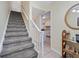 Carpeted stairs leading to the upper level at 120 Georgetown Dr, Casselberry, FL 32707