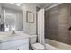 Clean bathroom, featuring a shower/tub combo and updated vanity at 13871 Briand Ave, Orlando, FL 32827