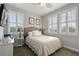 Charming bedroom with a neutral color scheme and plenty of light at 13871 Briand Ave, Orlando, FL 32827