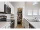 Kitchen with ample storage and pantry at 13871 Briand Ave, Orlando, FL 32827