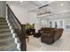 Spacious living area with a fireplace and comfortable seating at 13871 Briand Ave, Orlando, FL 32827