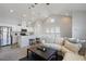 Open concept living room and kitchen at 13871 Briand Ave, Orlando, FL 32827
