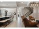 Open living space with kitchen and staircase views at 13871 Briand Ave, Orlando, FL 32827