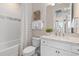 Clean bathroom with white vanity and shower/tub combo at 15813 Gem View St, Winter Garden, FL 34787