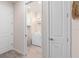 Laundry room with washer, dryer and storage cabinets at 15813 Gem View St, Winter Garden, FL 34787