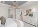 Main bedroom with access to en-suite bathroom and hallway at 15813 Gem View St, Winter Garden, FL 34787