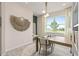 Home office with large window and built-in shelves at 15813 Gem View St, Winter Garden, FL 34787
