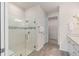 Large walk-in shower with glass enclosure and modern tile at 15813 Gem View St, Winter Garden, FL 34787