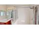 Bathroom featuring a tiled shower with glass door and vanity sink at 1855 Sugar Cove Ct, Ocoee, FL 34761