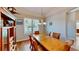 Traditional dining room with a wooden table, chairs, and natural light at 1855 Sugar Cove Ct, Ocoee, FL 34761