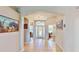 Bright foyer features tile flooring and arched doorways leading to other rooms at 1855 Sugar Cove Ct, Ocoee, FL 34761