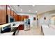 Well-equipped kitchen with stainless steel appliances, granite countertops, and ample storage at 1855 Sugar Cove Ct, Ocoee, FL 34761