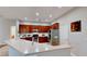 Spacious kitchen with stainless steel appliances and wooden cabinetry at 1855 Sugar Cove Ct, Ocoee, FL 34761