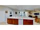 Bright kitchen with a large island that is open to the living spaces at 1855 Sugar Cove Ct, Ocoee, FL 34761