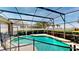 A beautifully enclosed pool featuring a waterfall at 1855 Sugar Cove Ct, Ocoee, FL 34761