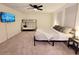 Spacious bedroom with king-size bed, bunk bed, and large TV at 2058 Derwent Dr, Davenport, FL 33896