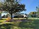 Community playground with slide and climbing structure at 2073 Shadyhill Ter, Winter Park, FL 32792