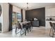 Bright dining area with table and chairs, adjacent to the kitchen at 2128 Silver Brook Way, Davenport, FL 33837