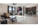 Open concept living and dining area with modern decor at 2128 Silver Brook Way, Davenport, FL 33837