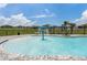 Refreshing sprayground next to community pool at 2128 Silver Brook Way, Davenport, FL 33837