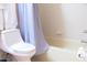 Bathroom with toilet, bathtub and shower at 227 Verona Ave, Davenport, FL 33897