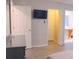 Bedroom with king bed, TV, and en-suite bathroom at 227 Verona Ave, Davenport, FL 33897