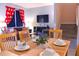 Dining area with view into living room and staircase at 227 Verona Ave, Davenport, FL 33897